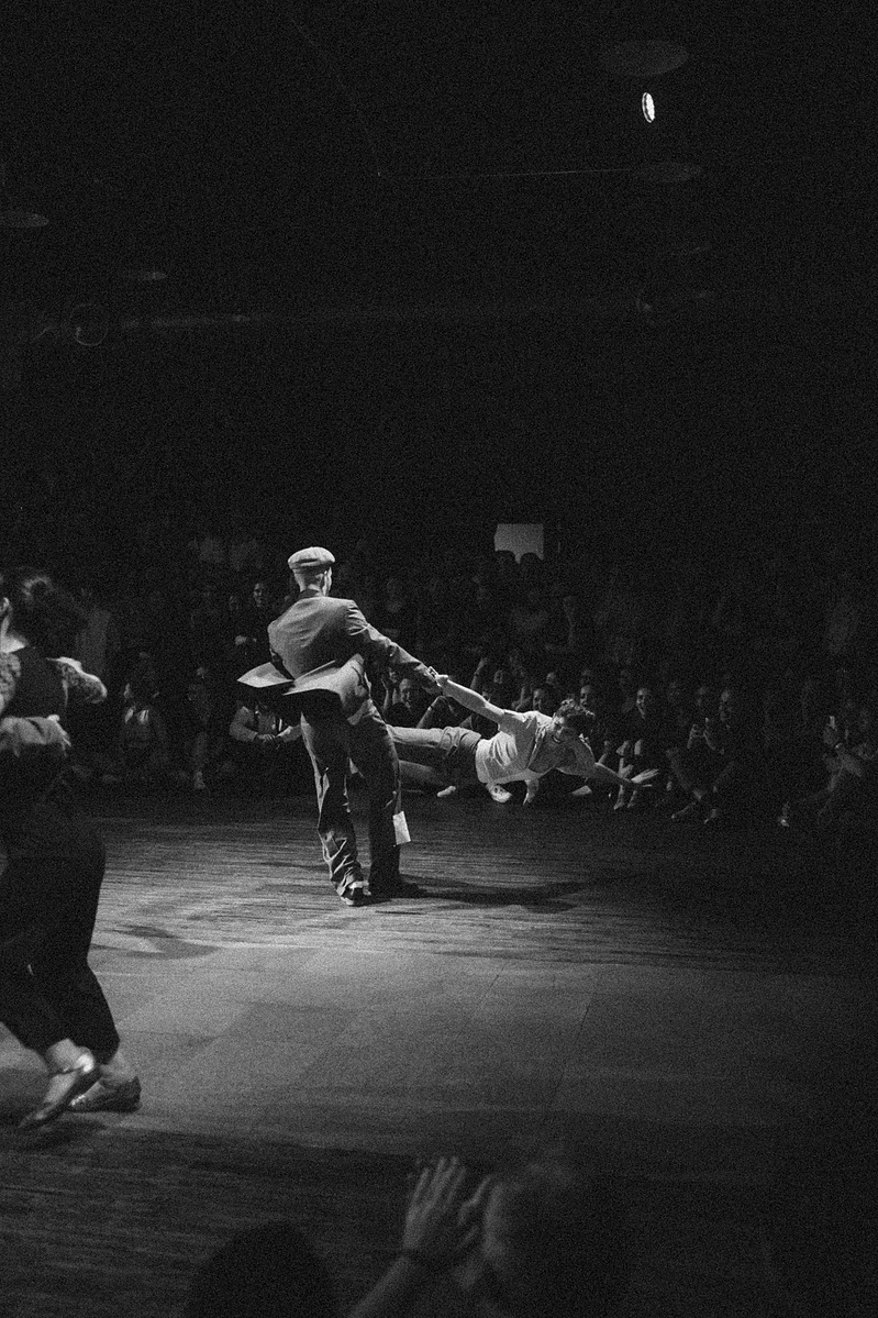 Swing dancers in motion